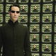 Neo stands in front of TVs with himself on them